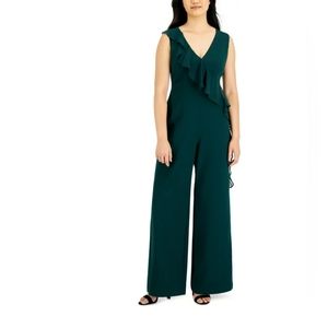 A timeless jumpsuit that can be worn any season. In excellent condition.